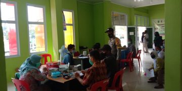 Polsek Kuala Kampar Amankan Giat Vaksinasi di Puskesmas