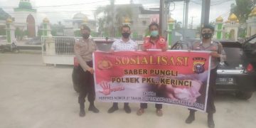 Polsek Pangkalan Kerinci Sosialisasi Saber Pungli Terhadap Parkir Ranmor Bank Riau Kepri