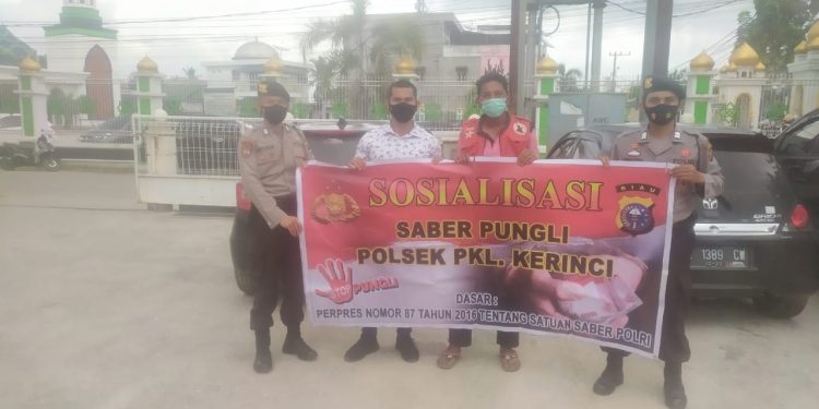 Polsek Pangkalan Kerinci Sosialisasi Saber Pungli Terhadap Parkir Ranmor Bank Riau Kepri