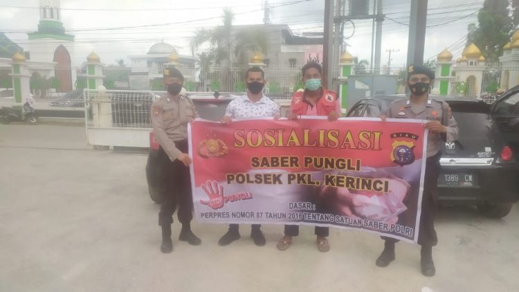 Polsek Pangkalan Kerinci Sosialisasi Saber Pungli Terhadap Parkir Ranmor Bank Riau Kepri