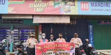 Polsek Pangkalan Kerinci Lakukan Sosialisasi Saber Pungli Kepada Juru Parkir