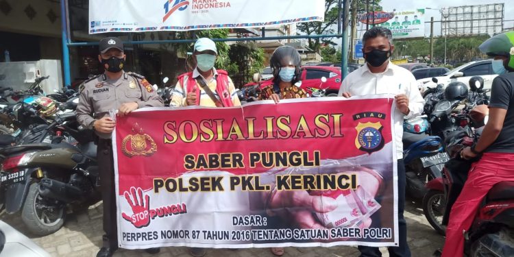 Polisi Beri Sosialisasi Saber Pungli Kepada Petugas Parkir Ranmor