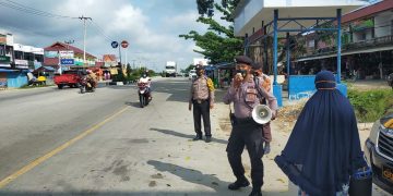 Polsek Pangkalan Kuras Cegah Covid-19 Melalui Sosialisasi Prokes dan Ajak Warga  Vaksinasi