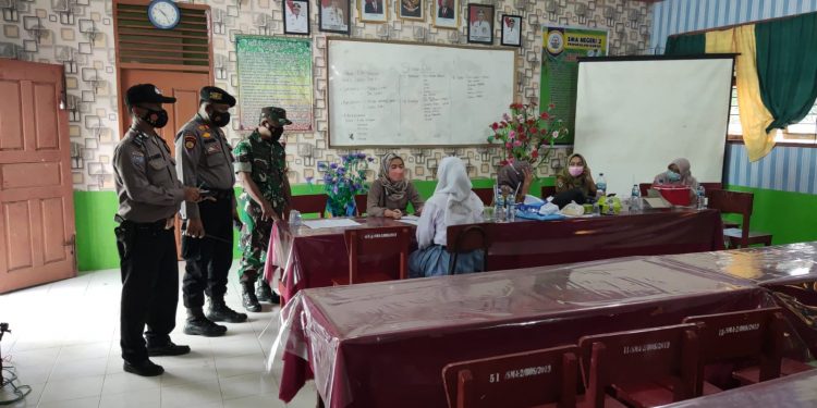 Demi Kelancaran Vaksinasi, Polsek Pangkalan Kuras Lakukan Pengamanan