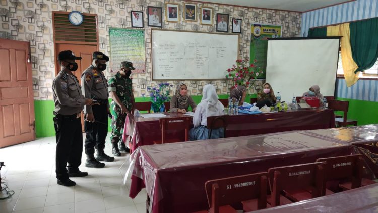 Demi Kelancaran Vaksinasi, Polsek Pangkalan Kuras Lakukan Pengamanan