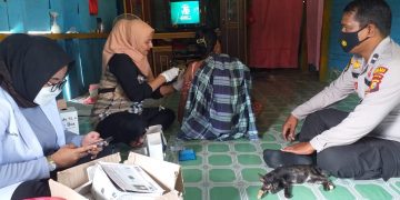 Polsek Langgam Terus Lakukan Vaksinasi, Capai 1.040 Orang yang Divaksin