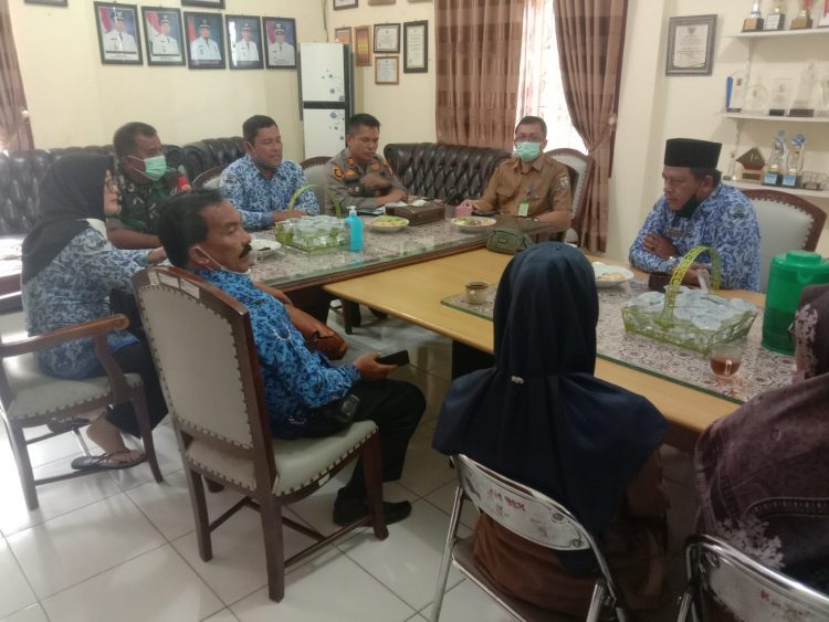 Kapolsek Bandar Sei Kijang dan Upika Lakukan Rapat Sosialisasi Soal Vaksinasi Anak