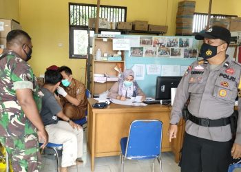 Polsek Teluk Meranti Tak Kenal Lelah Terus Monitoring Vaksinasi