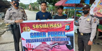 Akhir Pekan, Polsubsektor Pelalawan Keliling Sosialisasikan Saber Pungli