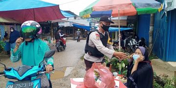 Dorong Disiplin Prokes Masyarakat, Personil Polsek Ukui Lakukan Giat Ini