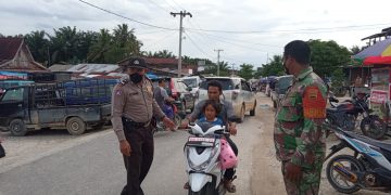 Giat Himbauan, Polsek Langgam : Masyarakat Waspada Aksi Kejahatan dan Terapkan Prokes
