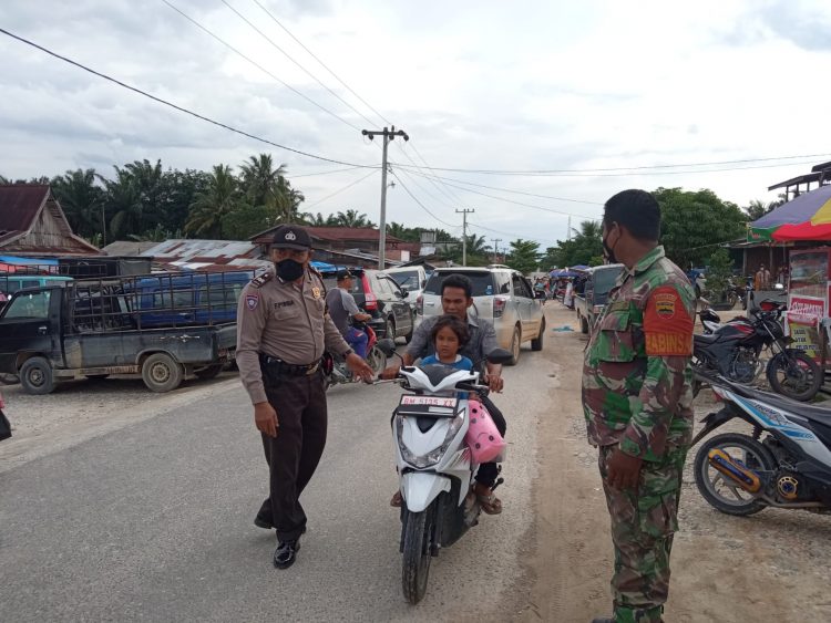 Giat Himbauan, Polsek Langgam : Masyarakat Waspada Aksi Kejahatan dan Terapkan Prokes