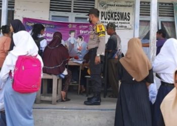 Polsek Teluk Meranti Lakukan Penjagaan di Gerai Vaksinasi Wilkum