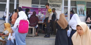 Polsek Teluk Meranti Lakukan Penjagaan di Gerai Vaksinasi Wilkum