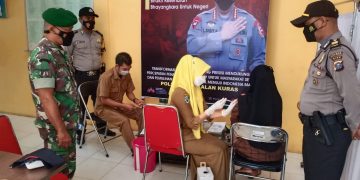 Polsek Pangkalan Kuras Pantau Giat Vaksinasi, Lakukan Pendataan dan Imbau Terapkan Prokes