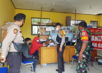 Polisi Pantau Giat di Gerai Vaksinasi Teluk Meranti