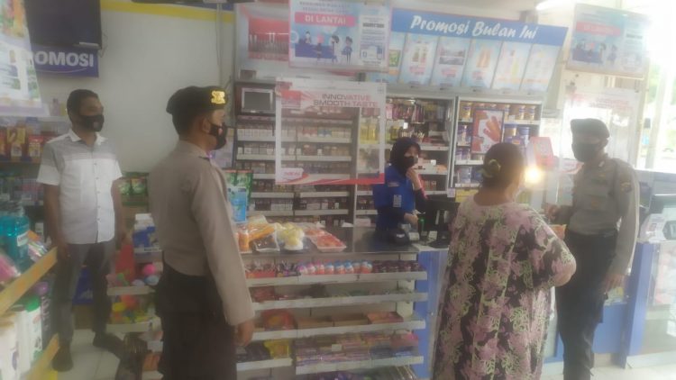 Sambangi Pusat Keramaian, Polsek Pangkalan Kerinci Ingatkan Masyarakat untuk Terapkan Prokes