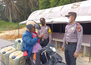 Kapolsek Kerumutan Gelar Operasi Pemeriksaan Vaksinasi