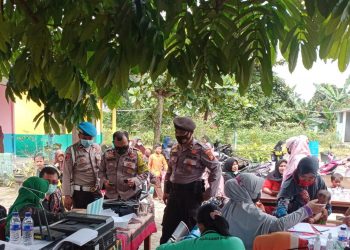 Polsek Bandar Sei Kijang Terus Bantu Proses Percepatan Vaksinasi, Berikut Datanya