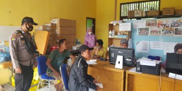 Kejar Target, Polsek Teluk Meranti Bantu Percepatan Vaksinasi