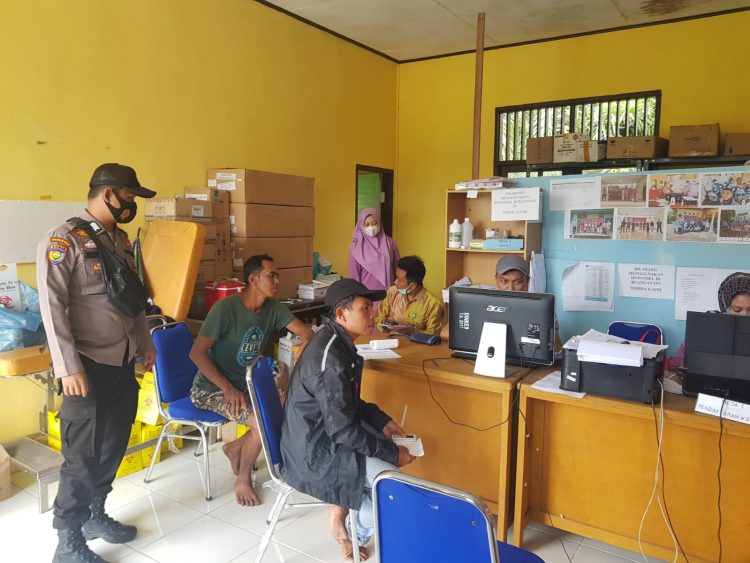 Kejar Target, Polsek Teluk Meranti Bantu Percepatan Vaksinasi