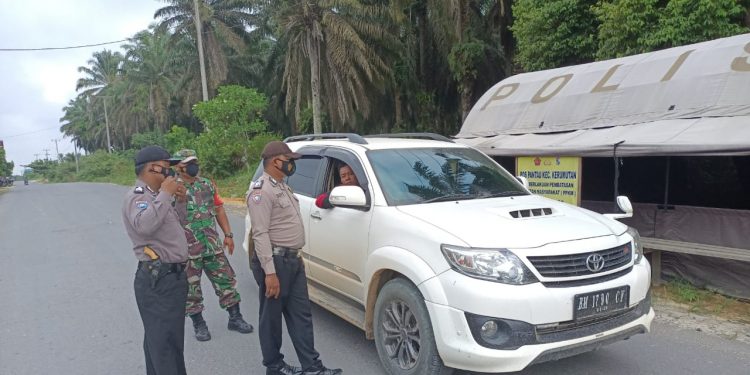 Polsek Kerumutan Minta Warga Terapkan Prokes