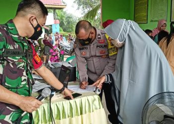 Polsek Bandar Sei Kijang Data Vaksinasi di Wilkum, Ini Pencapaiannya