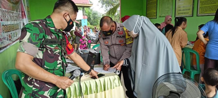 Polsek Bandar Sei Kijang Data Vaksinasi di Wilkum, Ini Pencapaiannya