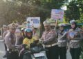 Subdit Kamsel Ditlantas Polda Riau Gelar Kampanye Keselamatan Berlalu Lintas dan Bagikan Helm SNI kepada Pengguna Jalan