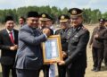 Merah Putih Berkibar, Pengabdian Mengakar di Sungai Apit