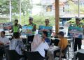 Ngopi Sambil Diingatkan Tertib Lalu Lintas, Polantas Aceh Sasar Warga di Warkop Pawang Kupi